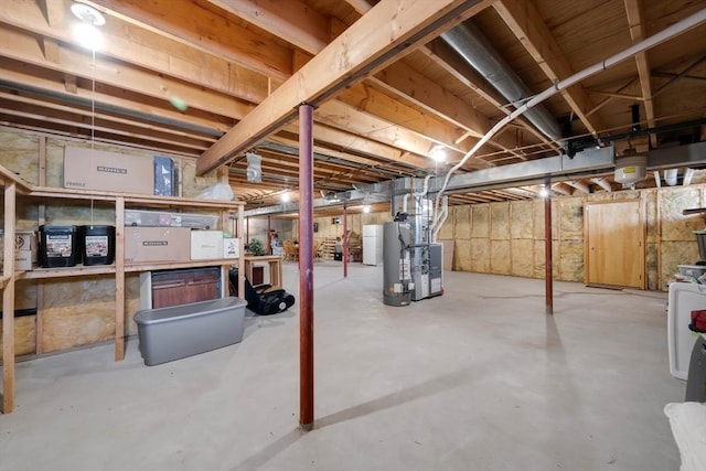 unfinished below grade area featuring heating unit
