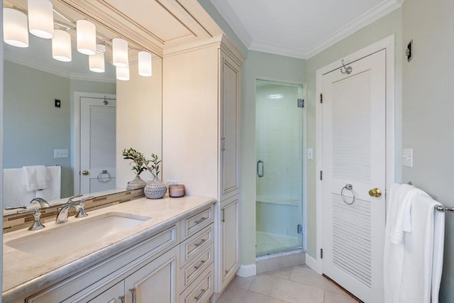 bathroom with ornamental molding, a stall shower, vanity, and tile patterned floors