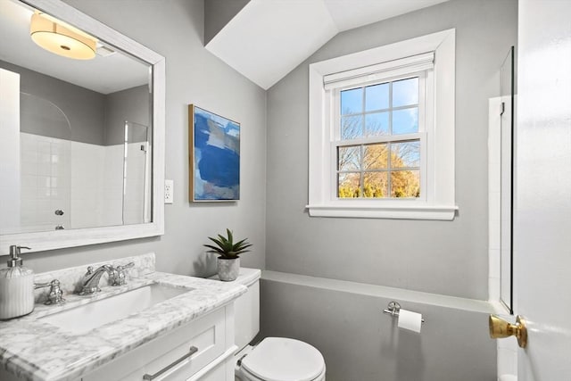 bathroom with vaulted ceiling, vanity, toilet, and walk in shower