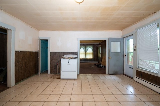 127 Cliff St, Southbridge, MA 01550 - kitchen featuring washer / clothes dryer, a baseboard heating unit, wainscoting, crown molding, and light tile patterned floors