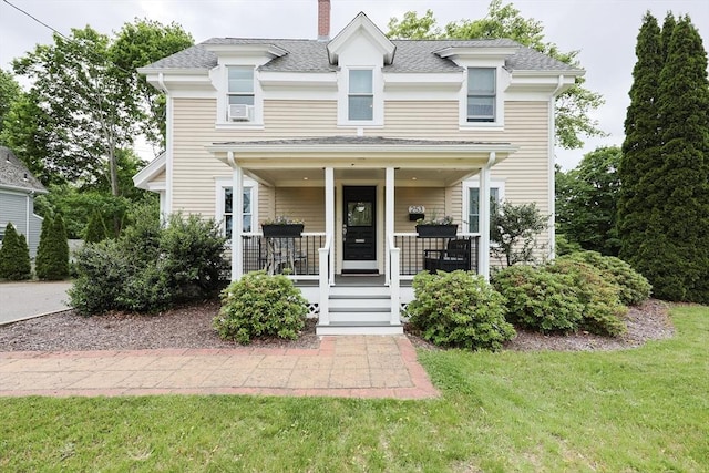 253 Front St, Weymouth, MA 02188 - view of front of home with a porch, a front yard, a chimney, and roof with shingles