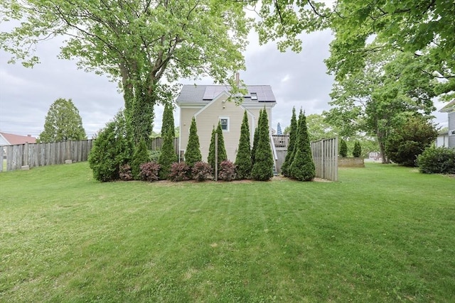 253 Front St, Weymouth, MA 02188 - view of property exterior with roof mounted solar panels