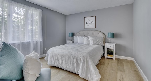 32 Sandy Reach Unit 32, Falmouth, MA 02536 - bedroom featuring baseboards and wood finished floors