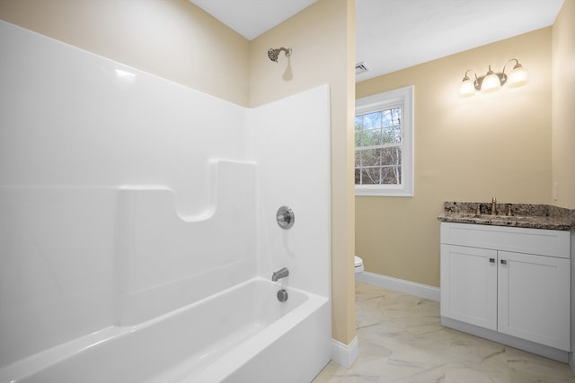 full bathroom with vanity, toilet, and shower / bathtub combination