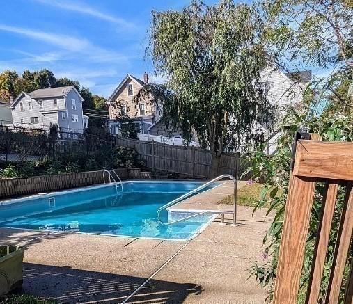 view of pool featuring a fenced in pool and a fenced backyard