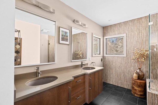 bathroom featuring vanity, tile walls, and tile patterned flooring