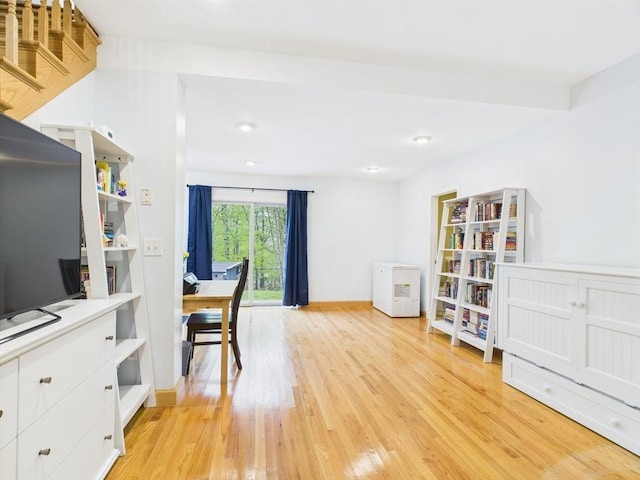 office area featuring light wood finished floors, baseboards, and recessed lighting