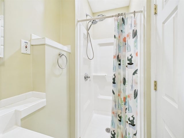 bathroom featuring a shower stall