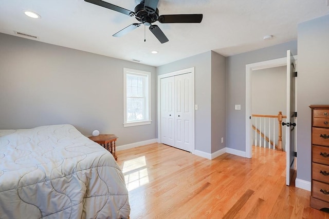 bedroom with recessed lighting, visible vents, baseboards, a closet, and light wood-type flooring