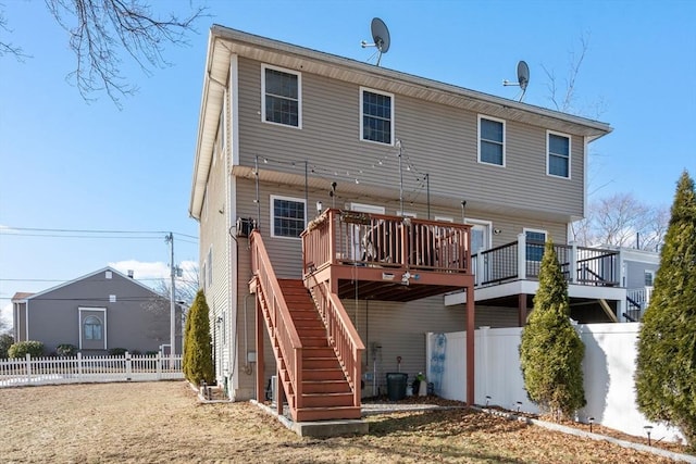 rear view of house with a deck