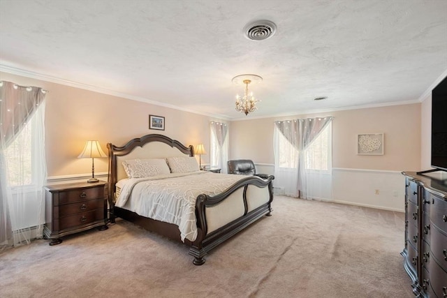 carpeted bedroom featuring a chandelier, ornamental molding, and baseboards