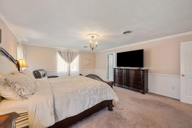 bedroom with carpet floors, crown molding, and a chandelier