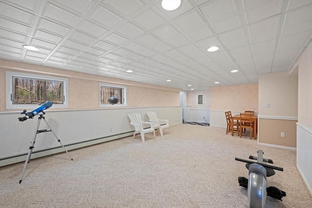 workout room with carpet floors, recessed lighting, and wainscoting