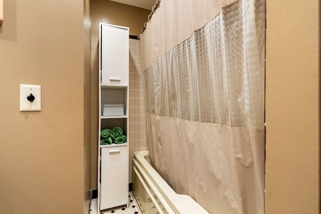 bathroom featuring shower / bath combo