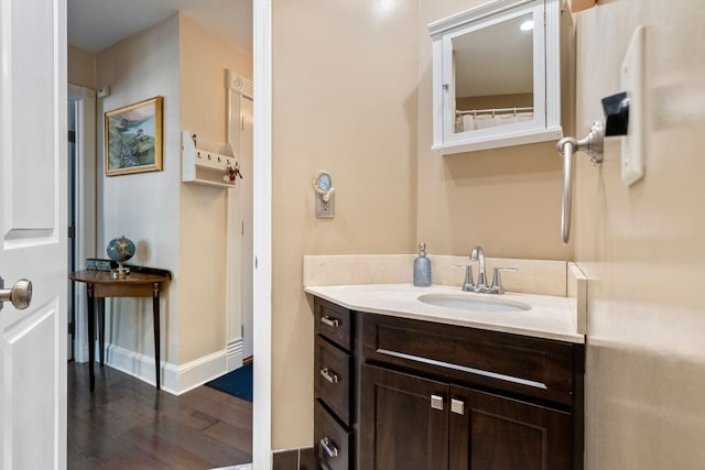 bathroom with wood-type flooring and vanity