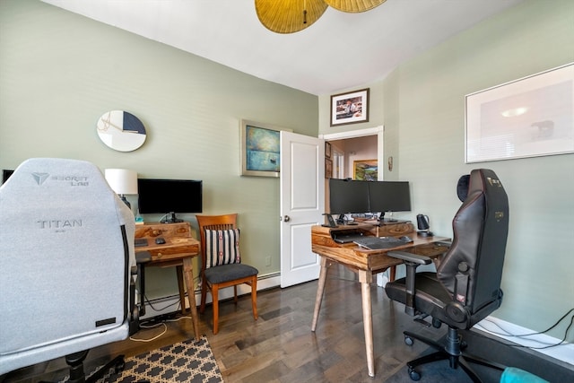 office area with dark hardwood / wood-style floors and ceiling fan