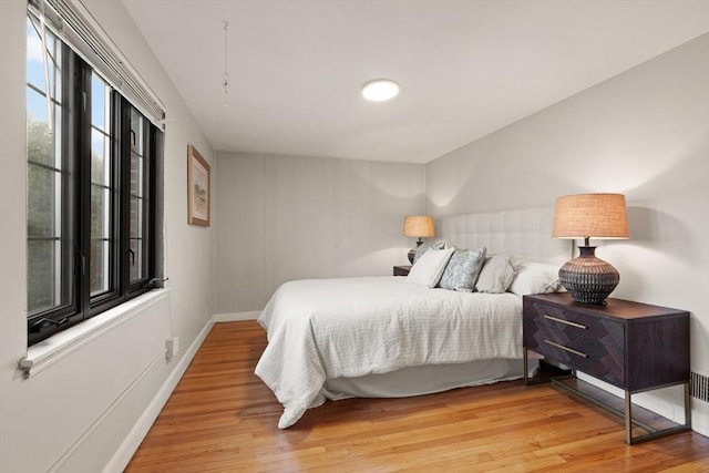 bedroom featuring light wood-type flooring