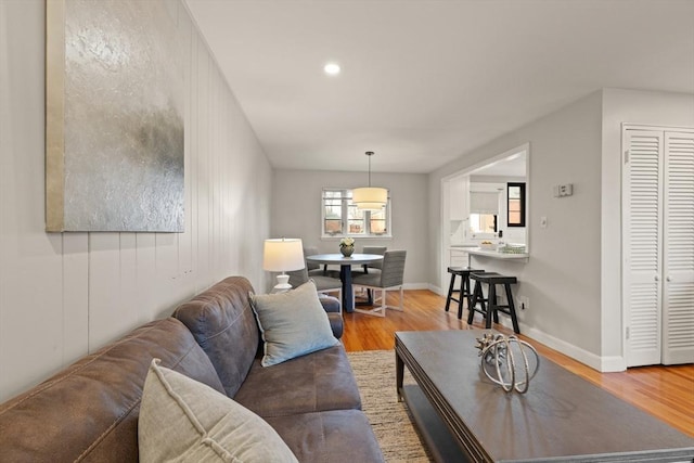 living room with light hardwood / wood-style floors