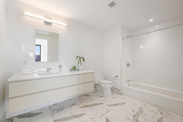 full bathroom with marble finish floor, visible vents, toilet, tub / shower combination, and vanity