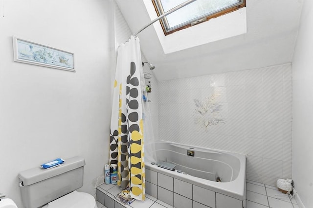 bathroom with shower / tub combo with curtain, toilet, and lofted ceiling with skylight