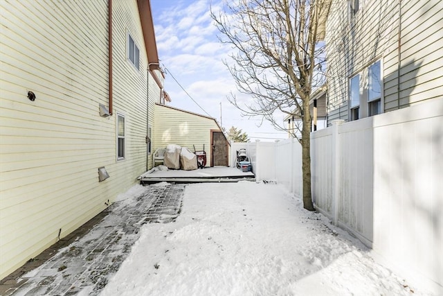 exterior space with a storage shed