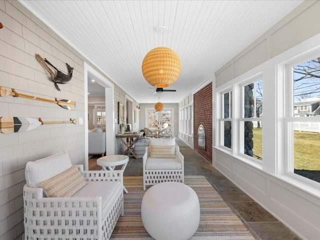 572 Jerusalem Rd, Cohasset, MA 02025 - sunroom / solarium featuring healthy amount of natural light, wood ceiling, and stone finish floors