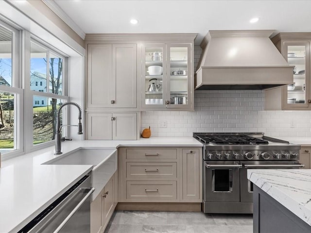 572 Jerusalem Rd, Cohasset, MA 02025 - kitchen featuring stainless steel appliances, custom range hood, healthy amount of natural light, backsplash, and recessed lighting
