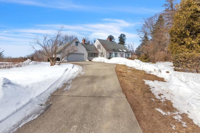 view of front of house featuring a garage and concrete driveway