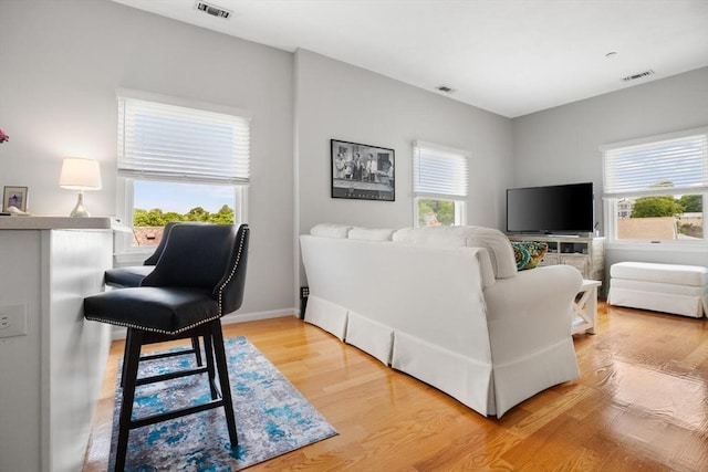 162 Willow Rd Unit 11, Nahant, MA 01908 - living area with healthy amount of natural light and light wood-style floors
