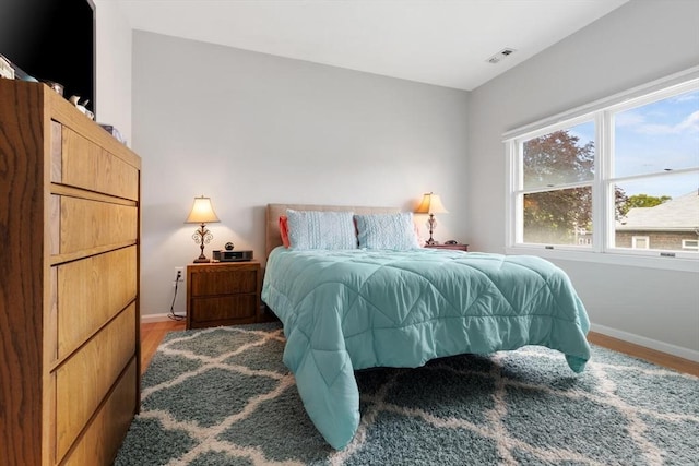 162 Willow Rd Unit 11, Nahant, MA 01908 - bedroom featuring baseboards and wood finished floors