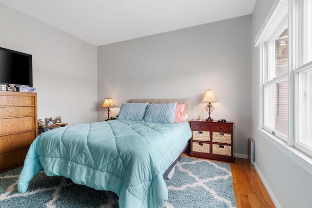 162 Willow Rd Unit 11, Nahant, MA 01908 - bedroom featuring wood finished floors and multiple windows