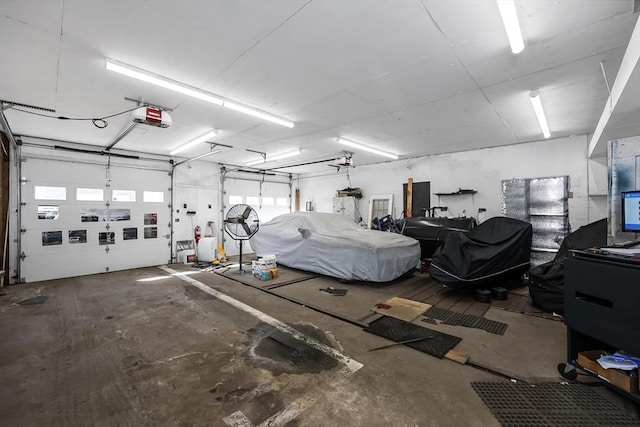 garage featuring a garage door opener