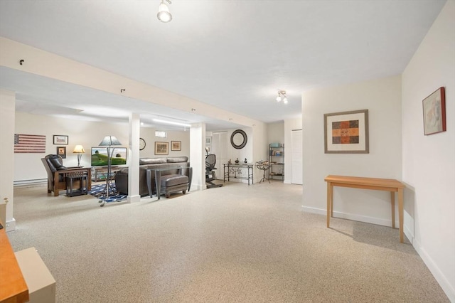 living room with a baseboard radiator