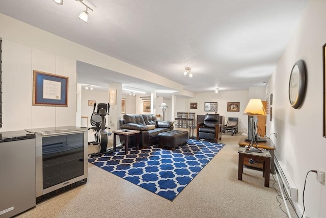 living room featuring beverage cooler and rail lighting