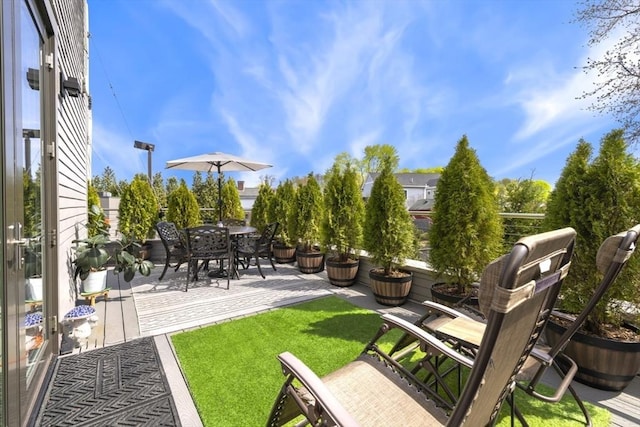view of patio featuring outdoor dining area