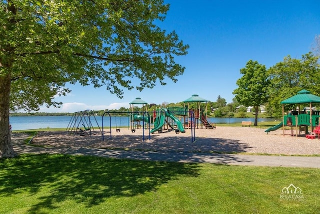 communal playground featuring a lawn