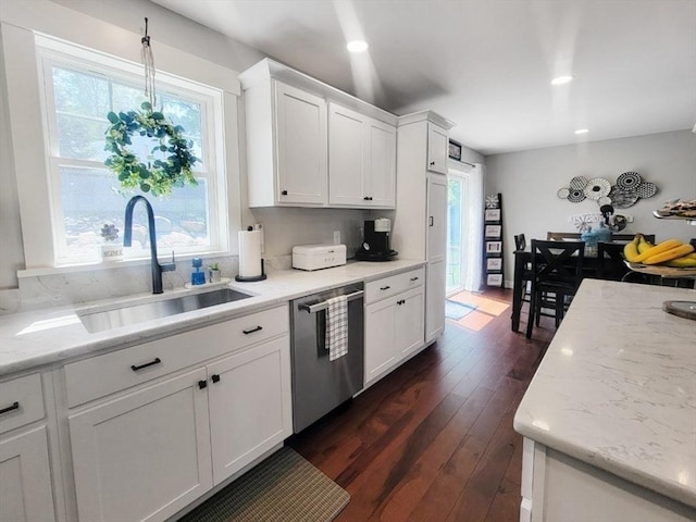 391 Gibbs St, Fall River, MA 02720 - kitchen with stainless steel dishwasher, a sink, white cabinetry, dark wood finished floors, and recessed lighting