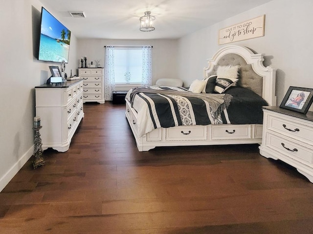 391 Gibbs St, Fall River, MA 02720 - bedroom with dark wood-type flooring and baseboards