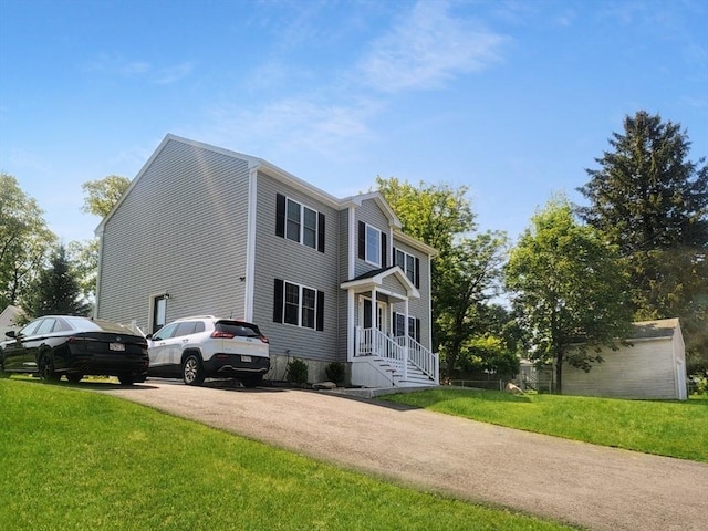 391 Gibbs St, Fall River, MA 02720 - view of front facade featuring a front lawn