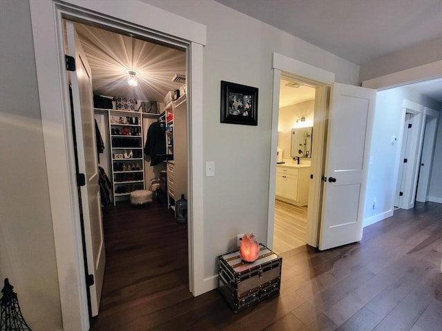 391 Gibbs St, Fall River, MA 02720 - corridor with dark wood-style flooring and baseboards