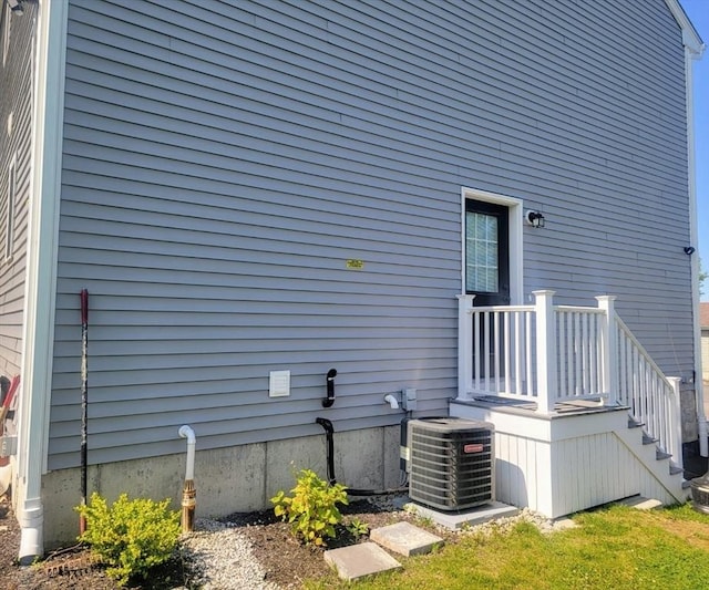 391 Gibbs St, Fall River, MA 02720 - view of side of property featuring central AC unit
