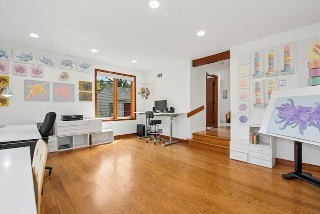 office featuring wood finished floors, recessed lighting, visible vents, and baseboards