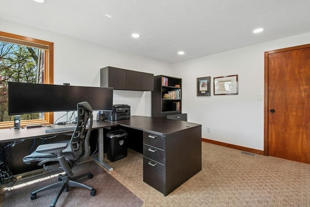 office with visible vents, recessed lighting, light colored carpet, and baseboards