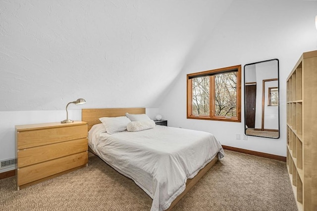 carpeted bedroom featuring visible vents, vaulted ceiling, and baseboards