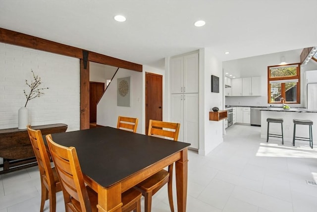 dining area with recessed lighting