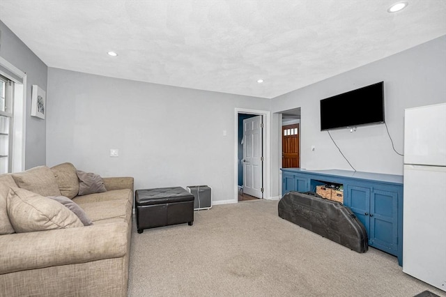 living room with carpet and recessed lighting
