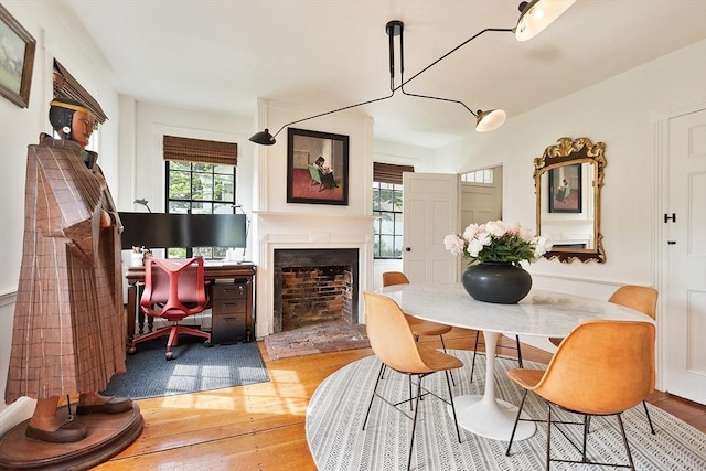 9 The Cmn, Royalston, MA 01368 - dining area with hardwood / wood-style flooring and a fireplace with raised hearth