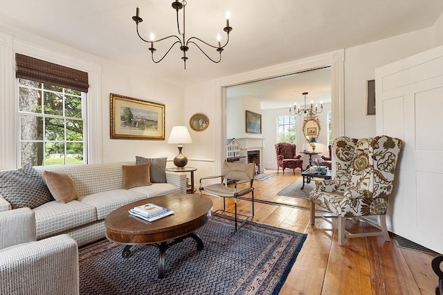 9 The Cmn, Royalston, MA 01368 - living area with a chandelier, hardwood / wood-style floors, and a fireplace