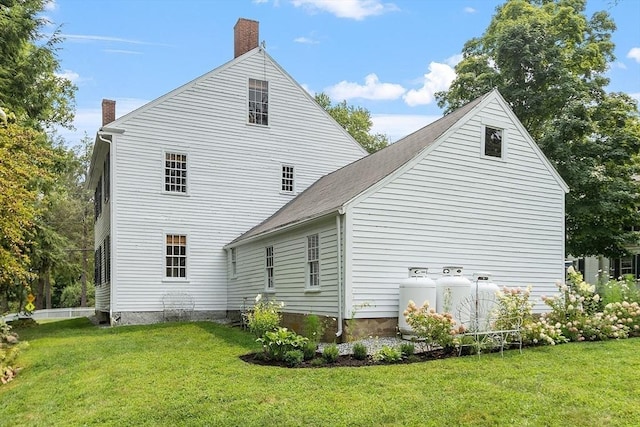 9 The Cmn, Royalston, MA 01368 - back of property featuring a chimney and a lawn