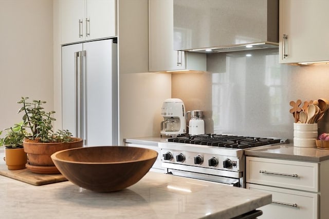 9 The Cmn, Royalston, MA 01368 - kitchen featuring custom exhaust hood, high end appliances, white cabinetry, backsplash, and light countertops